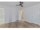 A bedroom featuring durable hardwood floors, neutral paint, and attached bath at 159 Aztec Se Way, Acworth, GA 30102