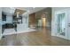 Spacious kitchen and dining area with a center island, stainless steel appliances, and hardwood floors at 3924 Ashford Dunwoody Road Northeast Ne Rd, Atlanta, GA 30319