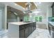 Open concept kitchen with center island overlooking the spacious living area at 3924 Ashford Dunwoody Road Northeast Ne Rd, Atlanta, GA 30319