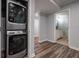 Convenient laundry area with stacked washer and dryer, and easy access to bathroom at 3924 Ashford Dunwoody Road Northeast Ne Rd, Atlanta, GA 30319