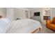 Bedroom featuring neutral walls, carpeted floors, and ensuite bath at 3937 Covey Flush Sw Ct # 25, Smyrna, GA 30082