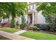 Charming two-story home with a brick facade, landscaped yard, and inviting front porch at 3937 Covey Flush Sw Ct # 25, Smyrna, GA 30082