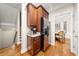Convenient kitchenette area with stainless steel appliances and views to the dining area at 3937 Covey Flush Sw Ct # 25, Smyrna, GA 30082
