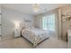 Cozy bedroom with pink bed and floral bedding at 1245 Mountain Ivey Ct, Sugar Hill, GA 30518