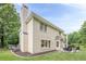 Exterior view of house from the backyard at 1245 Mountain Ivey Ct, Sugar Hill, GA 30518