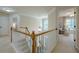 Upstairs hallway leading to bedrooms at 1245 Mountain Ivey Ct, Sugar Hill, GA 30518