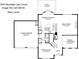 Floor plan featuring a kitchen, living room, dining room, patio and two-car garage at 1245 Mountain Ivey Ct, Sugar Hill, GA 30518