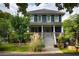 Charming two-story home featuring a welcoming front porch and beautifully landscaped front yard at 1602 Windsor Walk, Avondale Estates, GA 30002