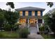Charming two-story home featuring a welcoming front porch and beautifully landscaped front yard at 1602 Windsor Walk, Avondale Estates, GA 30002