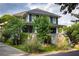 Attractive two-story home with a cozy front porch, complemented by lush greenery at 1602 Windsor Walk, Avondale Estates, GA 30002