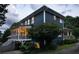 Back exterior of the beautiful home with a screened porch and backyard at 1602 Windsor Walk, Avondale Estates, GA 30002