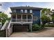 This home boasts a convenient garage and a charming screened porch for outdoor enjoyment at 1602 Windsor Walk, Avondale Estates, GA 30002