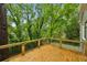 Wooden balcony overlooking a lush backyard at 2760 Fraser Se St, Smyrna, GA 30080