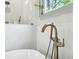 Close-up of a bathtub featuring bronze hardware at 2760 Fraser Se St, Smyrna, GA 30080