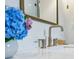 Close-up of a bathroom sink featuring a marble countertop and a modern faucet at 2760 Fraser Se St, Smyrna, GA 30080