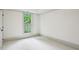 Bright bedroom with neutral walls and a large window providing natural light at 2760 Fraser Se St, Smyrna, GA 30080