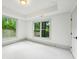 Bright bedroom with neutral walls and large windows providing plenty of natural light at 2760 Fraser Se St, Smyrna, GA 30080