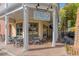 Stout Brothers Smyrna Beer Market with a yellow exterior, ample outdoor seating, and a welcoming atmosphere at 2760 Fraser Se St, Smyrna, GA 30080