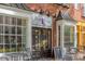 Charming Cafe Lucia with a brick exterior, inviting entrance, and outdoor seating, perfect for a relaxed atmosphere at 2760 Fraser Se St, Smyrna, GA 30080