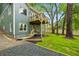 Back exterior of home with deck, yard, and new landscaping at 2760 Fraser Se St, Smyrna, GA 30080