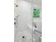 Walk-in shower featuring marble tiling and bronze hardware at 2760 Fraser Se St, Smyrna, GA 30080