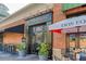 Vintage Tavern facade with a brick exterior, classic black trim, and inviting outdoor patio seating at 2760 Fraser Se St, Smyrna, GA 30080