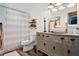 Charming bathroom with decorative vanity, vessel sink, and updated fixtures at 406 Country Park Se Dr, Smyrna, GA 30080