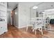 Dining area with white furniture and a mirrored wall, offering a bright and open space at 406 Country Park Se Dr, Smyrna, GA 30080