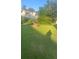 Large backyard featuring green grass at 10600 Pine Forest Ln, Jonesboro, GA 30238