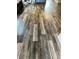 Interior view of stained engineered wood flooring at 10600 Pine Forest Ln, Jonesboro, GA 30238