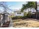 Spacious backyard with stone pathway and lush greenery at 18 Polo Ne Dr, Atlanta, GA 30309