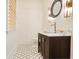 Stylish powder room features patterned tile flooring, a sink and decorative lighting at 18 Polo Ne Dr, Atlanta, GA 30309