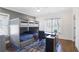 Bedroom with bunk beds, desk and large window for studying at 18 Polo Ne Dr, Atlanta, GA 30309