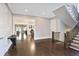 Lovely foyer with hardwood floors and staircase leading to second floor at 18 Polo Ne Dr, Atlanta, GA 30309