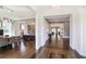 Open hallway showcasing hardwood floors, archways, and views into the dining room and other living spaces at 18 Polo Ne Dr, Atlanta, GA 30309