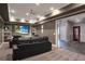 Comfortable home theater featuring plush seating, a large screen, and built-in shelving at 18 Polo Ne Dr, Atlanta, GA 30309