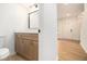 Bathroom with modern vanity, hardware, and flooring at 657 Stratford Green Way, Avondale Estates, GA 30002