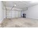 Spacious garage with a large door, plenty of room for parking and storage at 806 Chelsea Wood Ct, Stockbridge, GA 30281