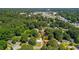 Lovely aerial view of a home nestled among mature trees in a quiet residential area at 941 Shirley Se St, Smyrna, GA 30082
