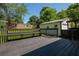Exterior of the house shows a backyard deck, green grass and a white detached garage at 941 Shirley Se St, Smyrna, GA 30082