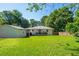 Well maintained backyard of a house with detached garage and a wooden deck at 941 Shirley Se St, Smyrna, GA 30082