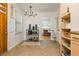 Bright dining area with modern lighting, a coffee bar, and convenient access to the living room at 941 Shirley Se St, Smyrna, GA 30082