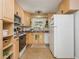 Functional kitchen boasts ample cabinet space, modern appliances, and a window for natural light at 941 Shirley Se St, Smyrna, GA 30082