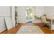 Inviting home office boasts hardwood floors, bright light, and a view of the backyard at 941 Shirley Se St, Smyrna, GA 30082