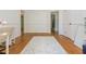Spacious home office with hardwood floors, multiple access doors, and ample natural light at 941 Shirley Se St, Smyrna, GA 30082