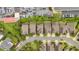 Aerial view capturing neighborhood layout with parking, rooftops, and landscaped streets at 12 Pine St, Roswell, GA 30075