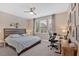 Comfortable bedroom featuring a bed, desk, and window with natural light at 12 Pine St, Roswell, GA 30075