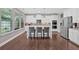 Beautiful kitchen featuring an island, stainless appliances, and an abundance of natural light at 12 Pine St, Roswell, GA 30075