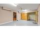 This basement has ample storage, a drop ceiling, and unfinished space at 230 Oakridge Se Dr, Cartersville, GA 30121
