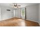 This bedroom has natural light, wood floors, and neutral paint at 230 Oakridge Se Dr, Cartersville, GA 30121